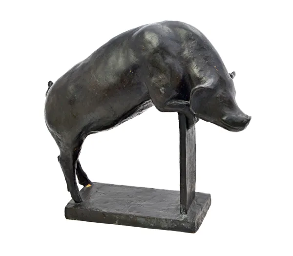 A patinated bronze model of a pig, 20th century, cast with front feet and head resting on a fence, the rectangular plinth base indistinctly signed 'E.