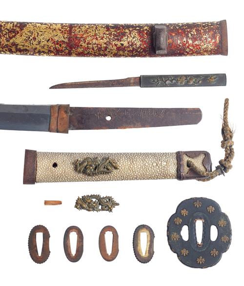A Japanese wakizashi, 19th century, the polished steel blade (55.5cm) with signed tang, shakudo decorated tsuba, fish skin grip with dragon menukis, i