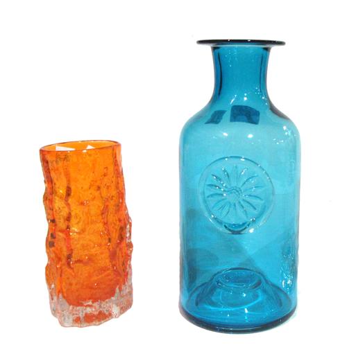A Whitefriars orange glass bark vase, 15.5cm high, three Dartington Crystal decanters, two tankards and two wine glasses, (8).   S12T