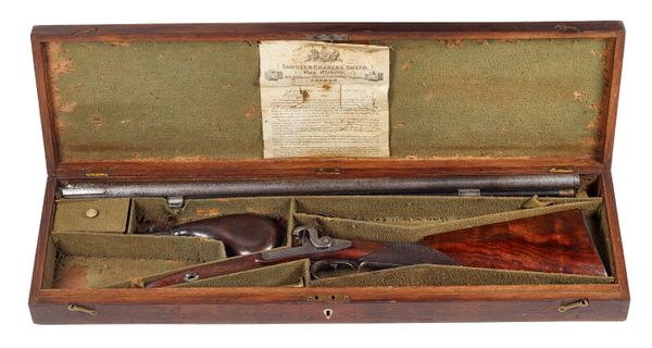 A double barrel percussion shotgun by Sam Smith, late 19th century, with side-by-side damascened steel barrels (74cm long) engraved with maker's name