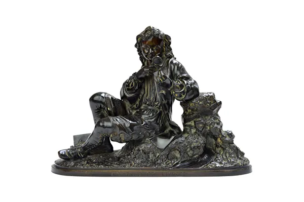 Entance de Linnee; a bronze of a young boy studying a flower with a magnifying glass, late 19th century, signed indistinctly, 34.5cm wide.  Illustrate