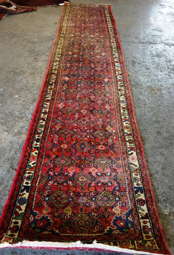 A Hussainabad runner, Persian, 406cm x 84cm.    F6