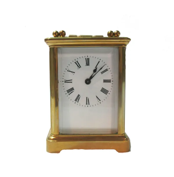 A French gilt brass cased carriage timepiece, circa 1900, with white enamel dial and single train movement, 10.5cm high (key).   CAB