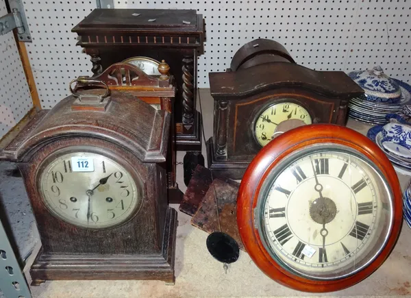 Collectables, comprising; a group of seven early 20th century clocks, including a wall mounted postman's type clock and six mantel clocks, (7).  S4B