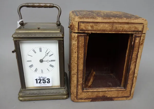 A brass gorge cased carriage clock, 19th century, with push repeat and a two train movement, 13cm high, with travel case and key, and one further bras