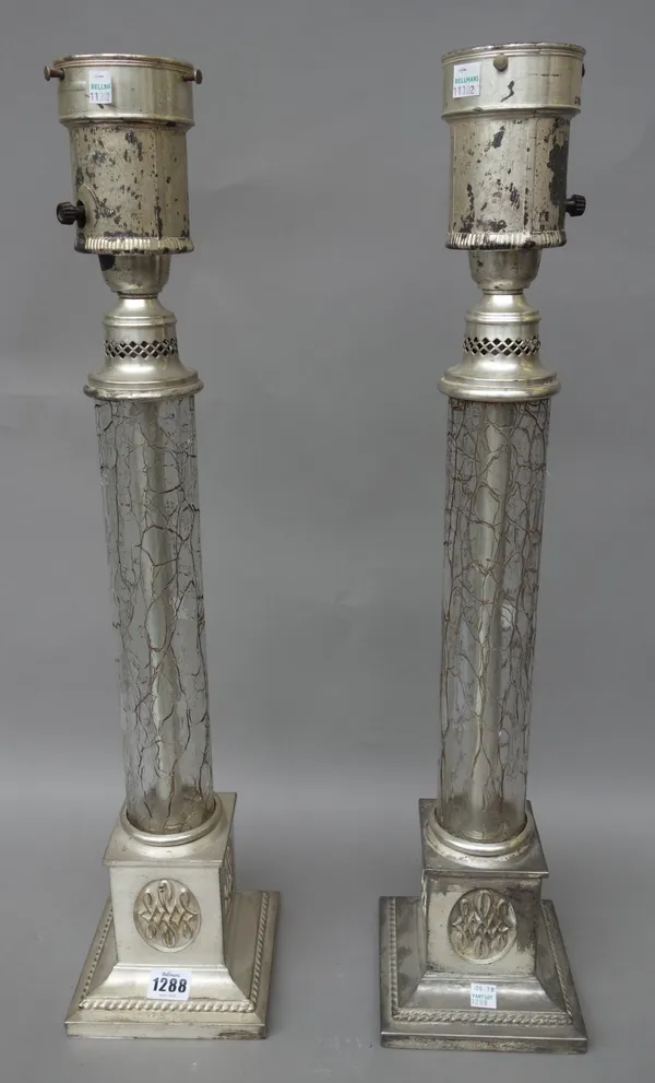 A pair of glass and silvered table lamps, late 20th century, each with craquelware glass column over a square silvered base, 65cm high, (2).