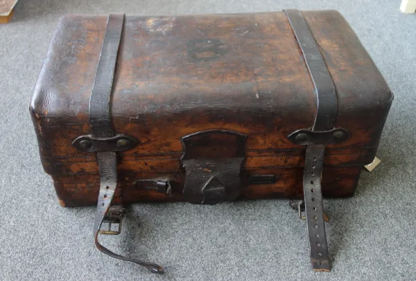 A late 19th century English leather gentleman's travelling trunk, with fitted interior, stamped brass lock 'Hodges', 78cm wide across the handles.