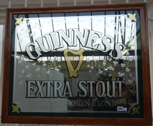 A 'Guiness Extra Stout' advertising mirror, framed, 84cm x 69cm overall.