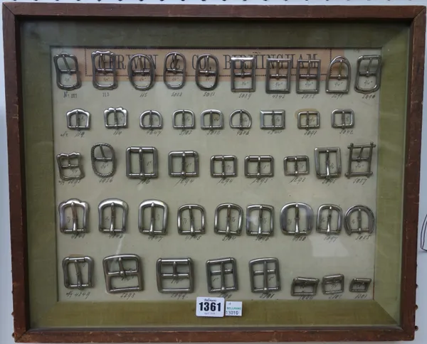 A collection of belt buckles and keys from Gerwin & Co Steel Works, Birmingham, each mounted in a glazed case, 44cm wide, (2).