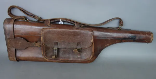 Three early 20th century 'leg of mutton' leather gun cases, one stamped 'J.A. Brooke Inniskilling Dragoons', 78cm long, (3).