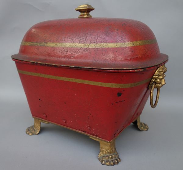 A Regency tole peinte coal purdonium, red and gilt, with domed lid and tapering rectangular body flanked by lion ring handles, on four lion paw feet,