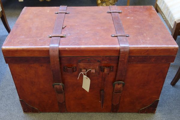 A modern faux leather bound wooden chest/trunk, with hinged interior and twin straps and handles, 92cm wide x 57cm high x 54cm deep.  Illustrated