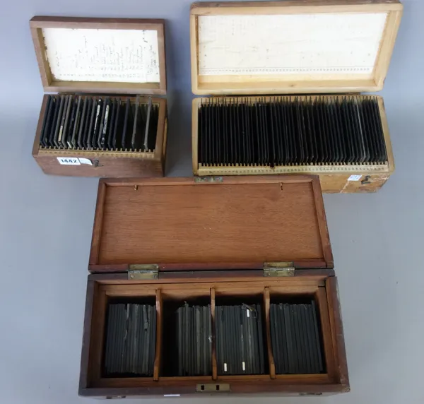 A quantity of three inch magic lantern glass slides, circa 1900 and later, including; Europe and Asia architectural (approximately 20), coloured relig