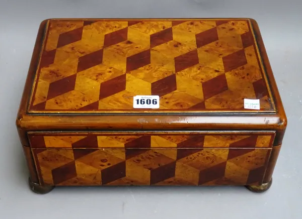 A 20th century rectangular twin division lift-top box, with specimen wood tumbling block parquetry decoration, 34cm wide x 14cm high x 24cm deep.