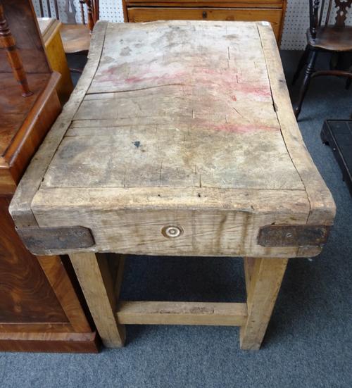 A metal bound rectangular butcher's block, on pine base, 91cm wide x 80cm wide x 61cm deep.