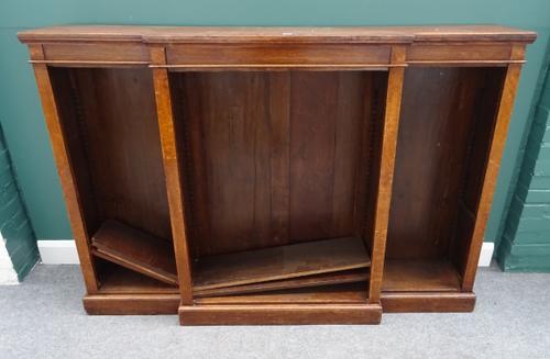 A 19th century oak floor standing triple section breakfront bookcase, on plinth base, 183cm wide x 126cm high x 39cm deep.