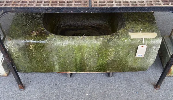 A rectangular carved stone trough, 100cm wide x 35cm high x 57cm deep.