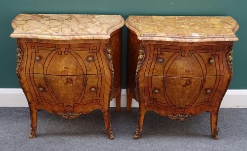 A pair of small Louis XV style commodes, each with serpentine marble top over a two drawer gilt metal mounted marquetry inlaid walnut and Kingwood bom