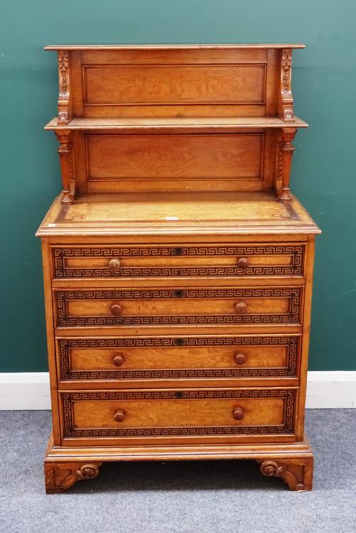 A Victorian figured ash chest, the two tier ledge back over four long graduated drawers, on carved bracket feet, 82cm wide x 130cm high x 42cm deep.
