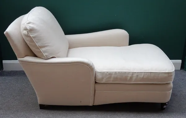 A 20th century cream upholstered day bed, on tapering square supports, 147cm long x 83cm high x 83cm wide.