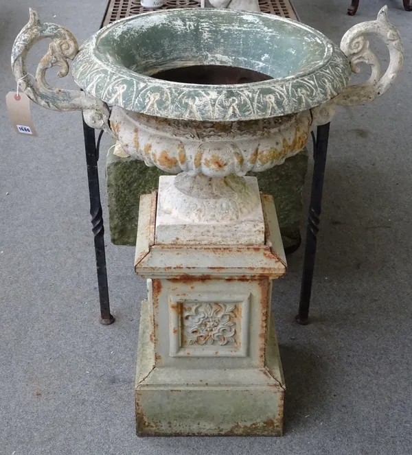 A set of six early 20th century cast iron twin handled jardinières, each with semi-lobed body on a stepped square pedestal, 82cm wide x 103cm high, (6
