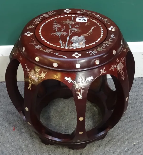 A 20th century Chinese mother-of-pearl inlaid hardwood jardiniere stand, of open barrel form, 39cm high x 35cm wide.