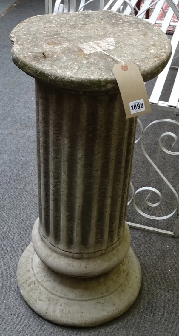 A pair of reconstituted stone circular columns, with fluted shafts, each 38cm diameter x 77cm high, (2).