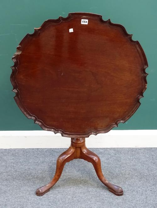 A mid-18th century marquetry occasional table, the dished pie-crust shaped top on turned column and tripod base, 72cm deep x 70cm high.