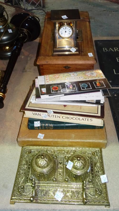 Stamps and collectables, including; a small mantel clock, stamps in various album boxes and sealed Royal Mint examples, (qty).  S2B