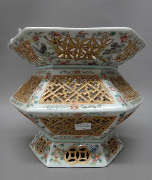 A Chinese famille-rose hanging lantern, late 19th century, of hexagonal form, the sides and everted rim pierced with gilt honeycomb, keyfret and folia