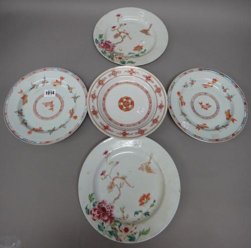 A pair of Chinese famille-verte plates, Kangxi, each painted with a central roundel enclosing an iron-red and gilt fish, against a ground with four fu