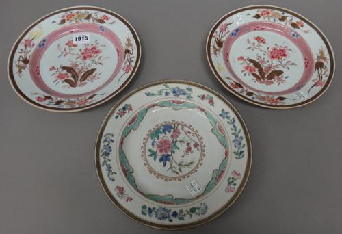A pair of Chinese famille-rose plates, Qianlong, each painted in the centre with flowering peony, beneath a border scattered with flower sprays, (a.f)