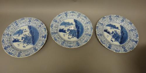 Six large Chinese blue and white hunting plates, 18th/19th century, each painted in the centre with two figures on horseback out hunting, inside a bor