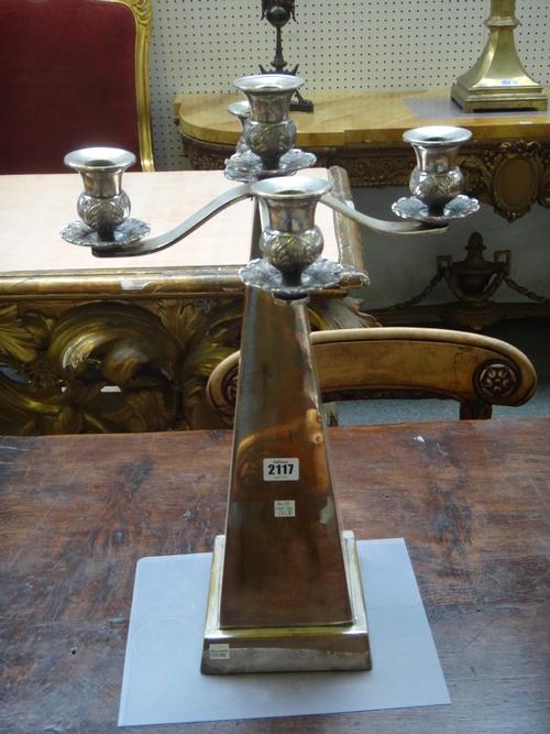 A pair of plated on brass, five light table candelabra, each raised on a tapering square column, with a square base, height 53cm.