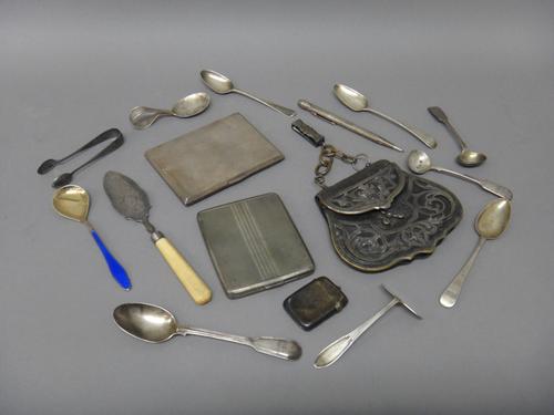 Silver, comprising; a rectangular cigarette case, a vesta case, a butter knife and nine items of flatware, also a Sterling silver cased propelling pen