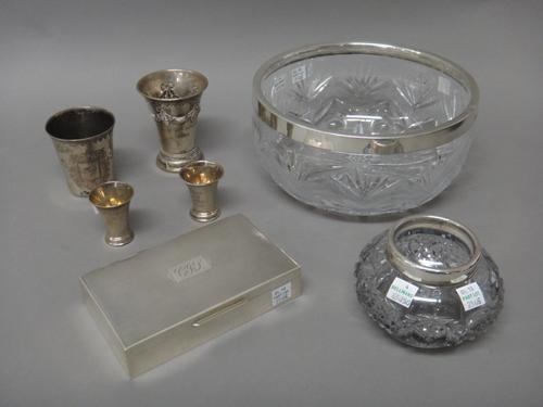 Silver and silver mounted wares, comprising; a rectangular table cigarette box, wooden lined within, London 1949, a silver rimmed cut glass salad bowl