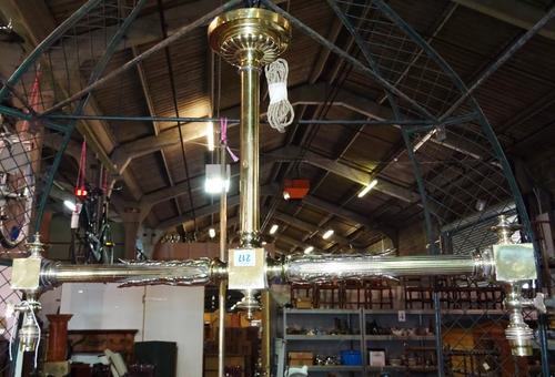 A Victorian style gilt metal two branch ceiling light, 20th century, formerly fitted for oil and now with electric fitments, the light of T-bar form,