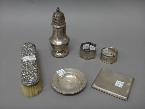Silver and silver mounted wares, comprising; a sugar caster, Birmingham 1967, a hexagonal napkin ring, a circular napkin ring, a circular Armada style