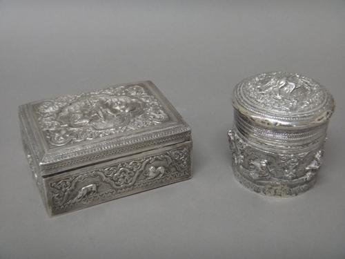 Asian wares, comprising; a rectangular hinge lidded box, embossed and chased with figures, birds and animals, presentation inscribed and dated 1918, w