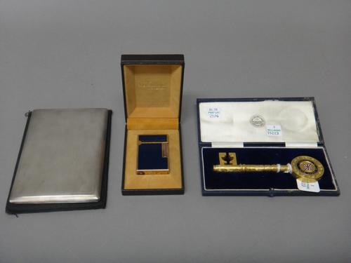 A Dunhill London silver rectangular cigarette case, with engine turned decoration, engraved within with a facsimile signature, Birmingham 1968, weight