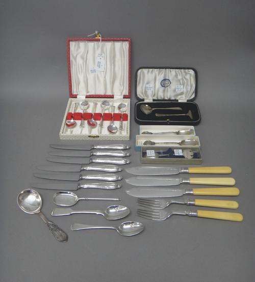 Silver flatware, comprising; a set of six teaspoons, Birmingham 1924, with a case, a child's pusher and spoon, Sheffield 1933, with a case, three fish