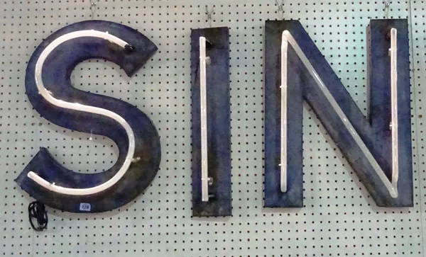 A 20th century painted metal sign "Sin" with fitted neon tubes, 64cm tall. A8