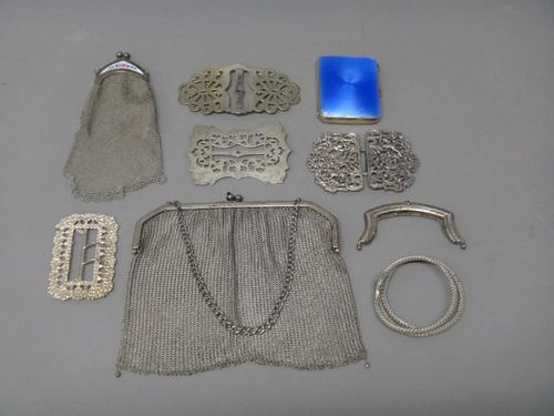 A silver and blue enamelled rectangular cigarette case, Birmingham 1927, a lady's plated chain mesh bag with floral enamelled decoration to the mount,
