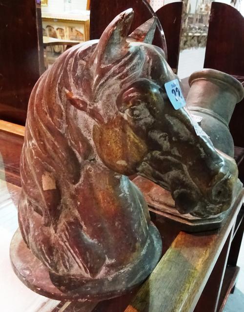 A late 19th century/ early 20th century bronze cast model of a horses head 25cm tall and a 20th century bronze model of a signal cannon, 19cm tall. (2