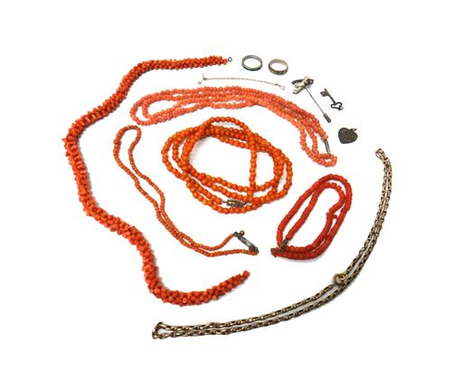 A gold oval link neckchain, on a boltring clasp, weight 8.3 gms, two coral necklaces, three imitation coral necklaces, two rings, an aeroplane stick p