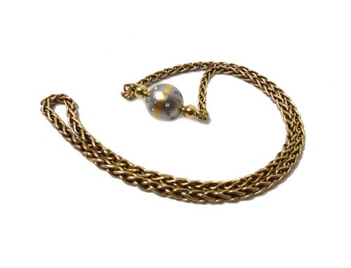 A gold necklace, in a multiple link design, detailed 750, with a two colour spherical clasp, having a matt finish and mounted with small circular cut
