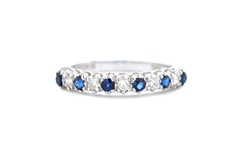 An 18ct white gold, sapphire and diamond set eleven stone half hoop eternity ring, mounted with six circular cut sapphires, alternating with five circ