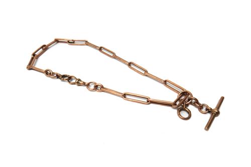 A gentleman's 9ct gold bar and oval link watch Albert chain, fitted a T bar, a 9ct gold swivel and with a boltring, detailed 9C, weight 49.5 gms.