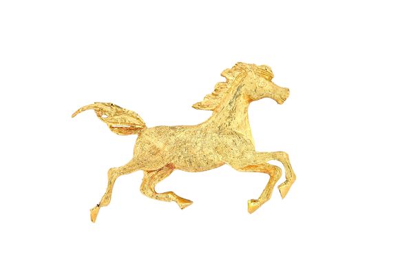 An 18ct gold brooch, designed as a horse, weight 8.1 gms, with a case.  Illustrated