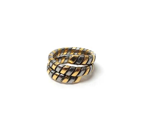 A Bvlgari gold and white coloured metal ring, in a coiled design, ring size approx U, with a Bvlgari case.